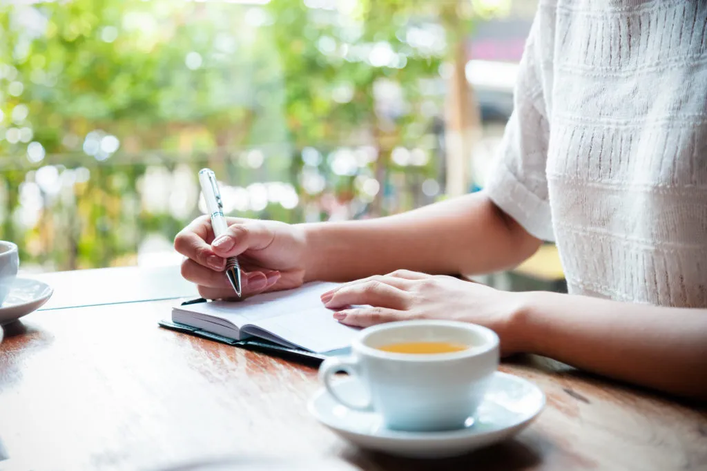 journaling by window