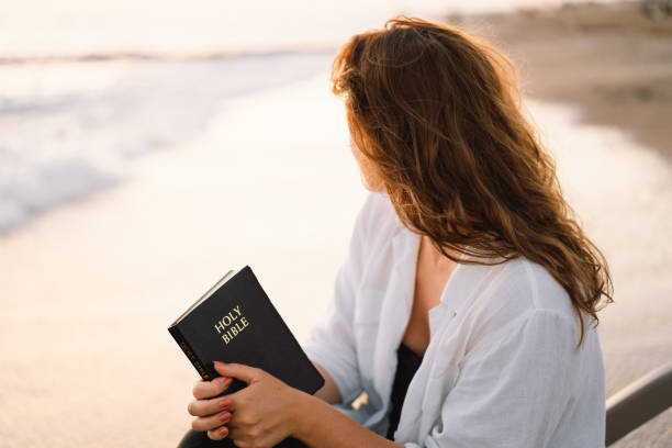 praying on beach